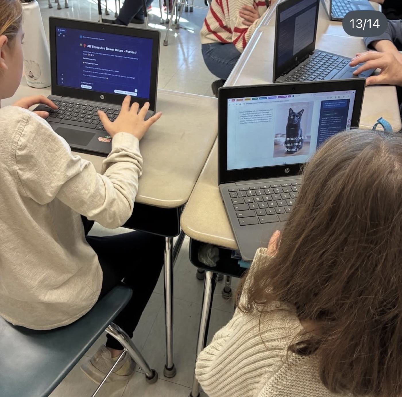 Students writing with ImagineAI on classroom laptops